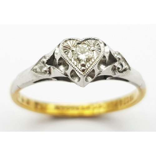 246 - A Vintage 18K Yellow Gold and Platinum Diamond Solitaire Ring. A brilliant round cut diamond set in ... 