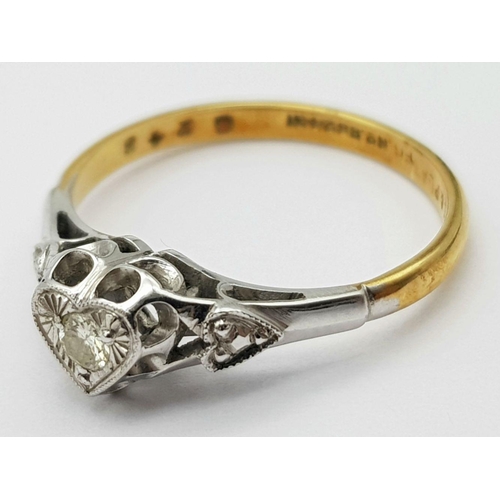 246 - A Vintage 18K Yellow Gold and Platinum Diamond Solitaire Ring. A brilliant round cut diamond set in ... 