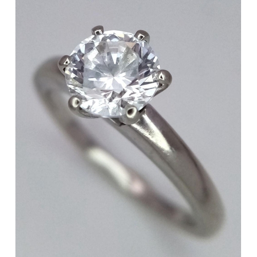 262 - A 14k white gold single stone 6 claw ring set with a 7mm cubic zirconia. Size N. 1/2, 4g