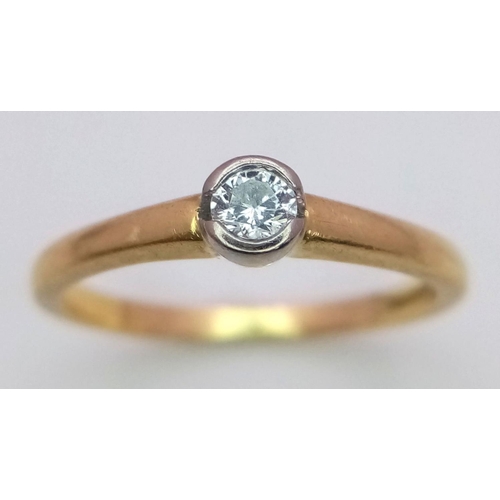 269 - An 18k Yellow Gold Diamond Solitaire Ring. 2.8g total weight. 0.10ct diamond. Size N