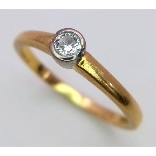 269 - An 18k Yellow Gold Diamond Solitaire Ring. 2.8g total weight. 0.10ct diamond. Size N