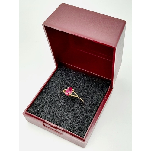 273 - 9 carat GOLD and RUBY RING. Dainty and Delicate with Oval Cut Ruby in four claw mount. 1.1 grams. Si... 