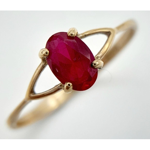 273 - 9 carat GOLD and RUBY RING. Dainty and Delicate with Oval Cut Ruby in four claw mount. 1.1 grams. Si... 