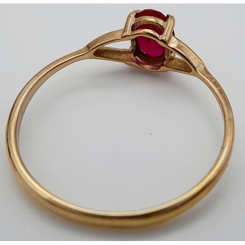 273 - 9 carat GOLD and RUBY RING. Dainty and Delicate with Oval Cut Ruby in four claw mount. 1.1 grams. Si... 