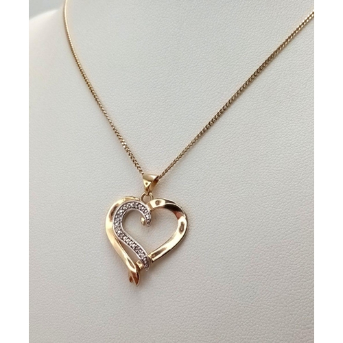 280 - DIAMOND SET HEART PENDANT with NECKLACE from HARVEY NICHOLS of  KNIGHTSBRIGE. Gilded in 18 carat Gol... 