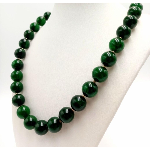 380 - A Beautiful Rich Dark Green Jade Bead Necklace with Gold Clasp. 14mm beads. 55cm length