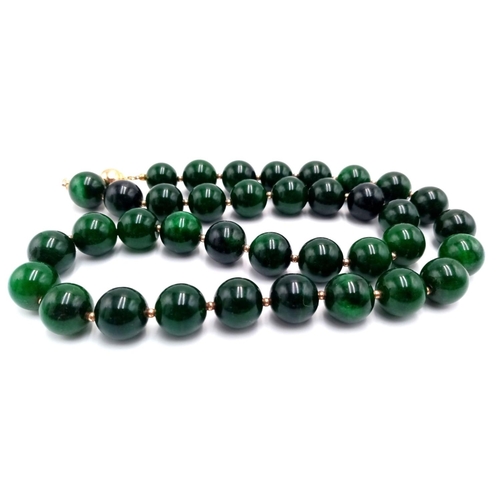 380 - A Beautiful Rich Dark Green Jade Bead Necklace with Gold Clasp. 14mm beads. 55cm length