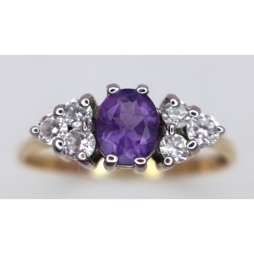 402 - A Vintage 9K Yellow Gold Amethyst and White Zircon Ring. Size N 1/2. 1.45g total weight.