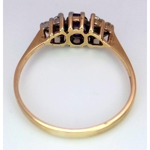 402 - A Vintage 9K Yellow Gold Amethyst and White Zircon Ring. Size N 1/2. 1.45g total weight.