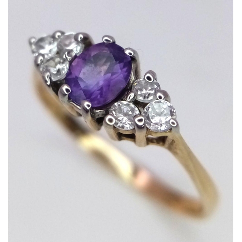 402 - A Vintage 9K Yellow Gold Amethyst and White Zircon Ring. Size N 1/2. 1.45g total weight.