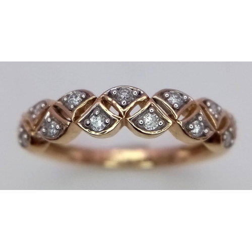 411 - A 9K YELLOW GOLD DIAMOND RING. 0.17CT. 2G. SIZE L.