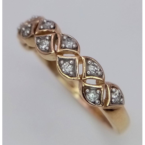 411 - A 9K YELLOW GOLD DIAMOND RING. 0.17CT. 2G. SIZE L.