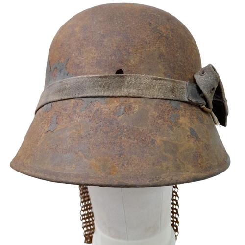 55 - WW1 German “Splitterschutz” Heavy machine gunners veil and helmet.