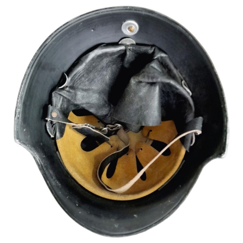 903 - WW2 German “Feuerwehr” Firefighters Helmet. Complete with decals, chin strap and nape protector.