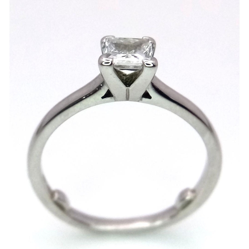 106 - A PLATINUM AND DIAMOND SOLITAIRE RING - PRINCESS CUT. 0.50CT. 4.1G. SIZE M.