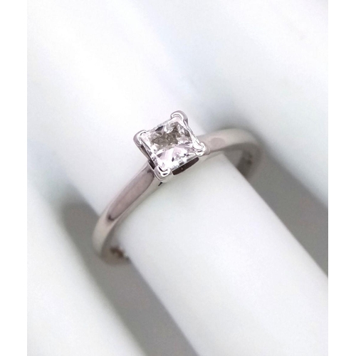 106 - A PLATINUM AND DIAMOND SOLITAIRE RING - PRINCESS CUT. 0.50CT. 4.1G. SIZE M.