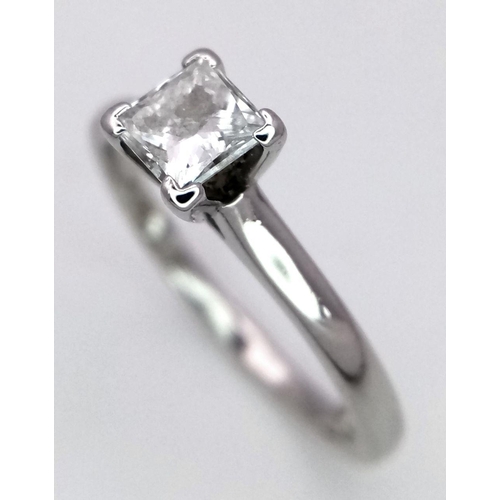 106 - A PLATINUM AND DIAMOND SOLITAIRE RING - PRINCESS CUT. 0.50CT. 4.1G. SIZE M.