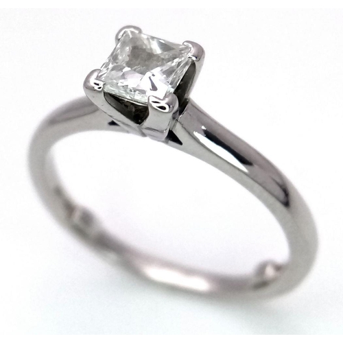 106 - A PLATINUM AND DIAMOND SOLITAIRE RING - PRINCESS CUT. 0.50CT. 4.1G. SIZE M.