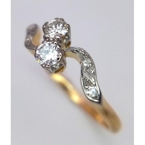 116 - AN 18K YELLOW GOLD & PLATINUM ( TESTED ) VINTAGE 2 STONE OLD CUT DIAMOND TWIST RING. 0.30CT. 2.3G. S... 