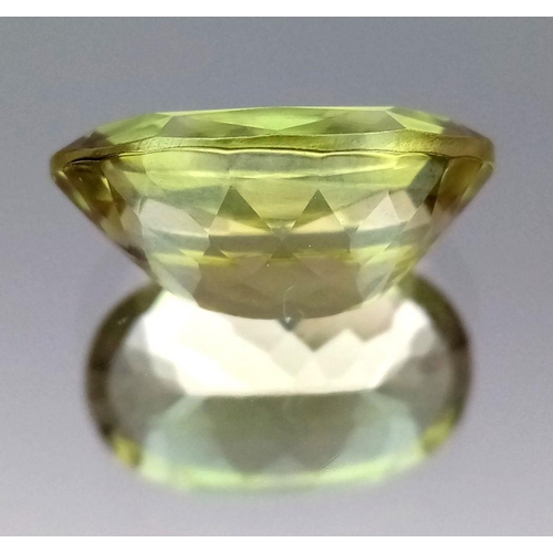 128 - A GIA CERTIFIED DIASPORE GEMSTONE - 6.16CT. OVAL CUT