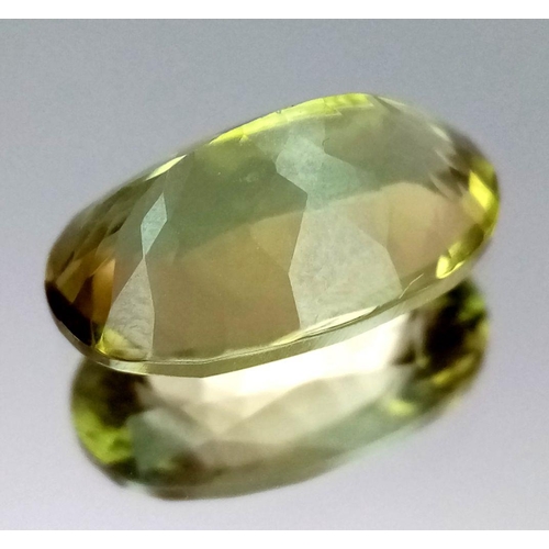 128 - A GIA CERTIFIED DIASPORE GEMSTONE - 6.16CT. OVAL CUT