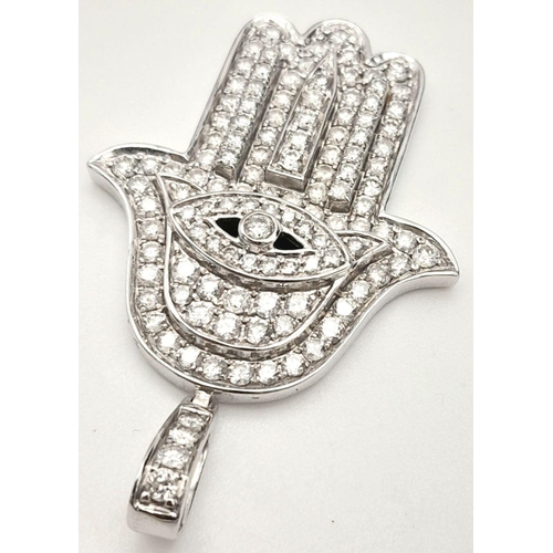 186 - A 9K WHITE GOLD DIAMOND SET HAMSA HAND PENDANT - 1.25CT, 6.3G.