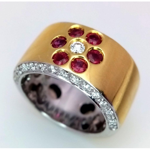 19 - AN 18K YELLOW GOLD DIAMOND & RUBY FLORAL RING - 0.40CT. 14G TOTAL WEIGHT. SIZE N.