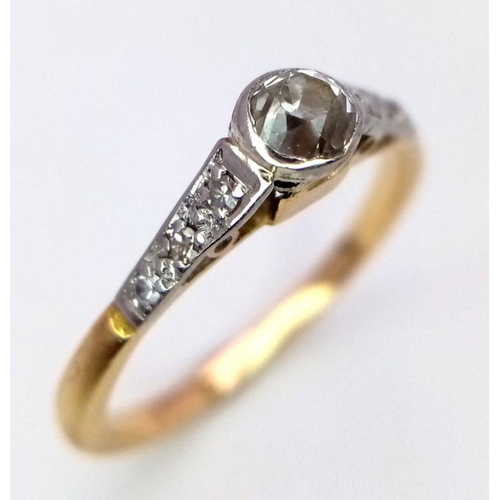 242 - AN 18K YELLOW GOLD VINTAGE DIAMOND SOLITAIRE RING WITH DIAMOND SHOULDERS - OLD CUT CENTRE DIAMOND. 0... 