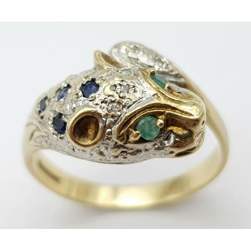 264 - A 9K YELLOW GOLD DIAMOND, SAPPHIRE & EMERALD SET PANTHER RING - 5G. SIZE R.