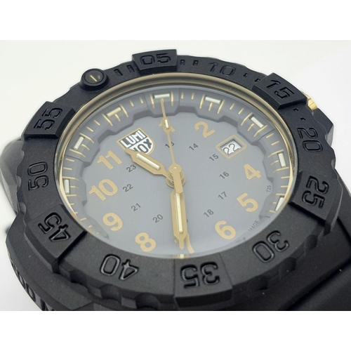 268 - An Unworn, Luminox Navy Seal 3500 Series Watch Model XS 3508 Gold. 50mm Case. Full Military Spec. Co... 