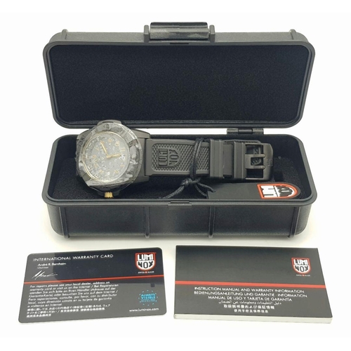 268 - An Unworn, Luminox Navy Seal 3500 Series Watch Model XS 3508 Gold. 50mm Case. Full Military Spec. Co... 