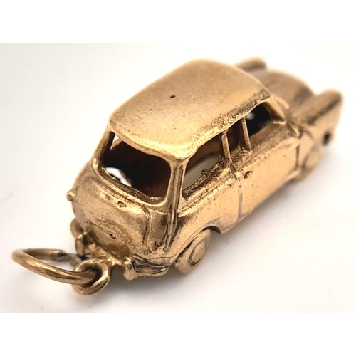 306 - A 9K YELLOW GOLD MINI COOPER CAR CHARM. 4.1G