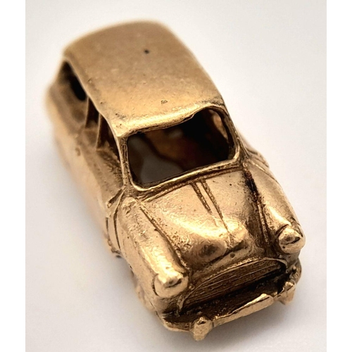 306 - A 9K YELLOW GOLD MINI COOPER CAR CHARM. 4.1G