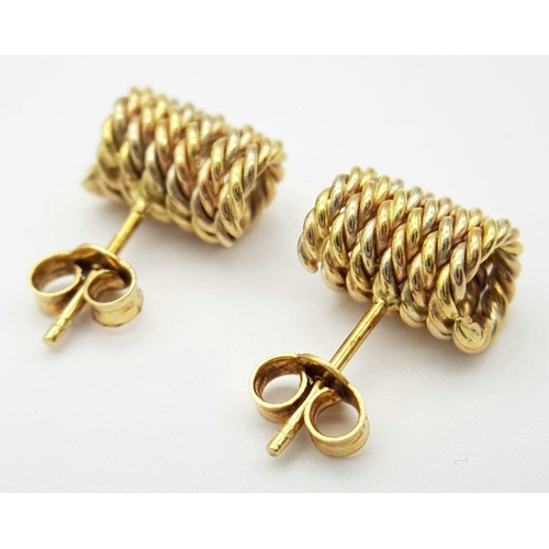 311 - A pair of 18k Yellow Gold Oblong Rope Studs earrings. 4.4g total weight.