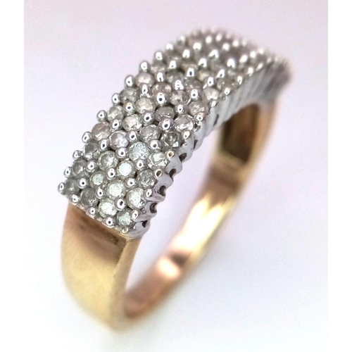 369 - A 9K YELLOW GOLD DIAMOND 4 ROW RING 0.60CT 4.9G SIZE S.

SC 1093