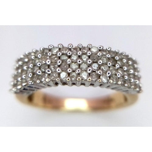 369 - A 9K YELLOW GOLD DIAMOND 4 ROW RING 0.60CT 4.9G SIZE S.

SC 1093