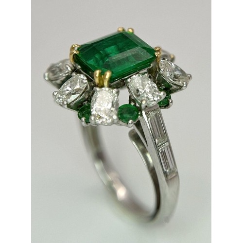 4 - A Stunning Emerald and Diamond Ring. Emerald cut centre emerald - 2.5ct with an emerald -0.8ctw and ... 