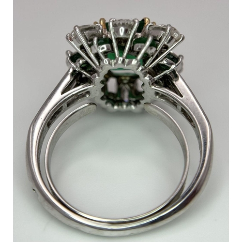 4 - A Stunning Emerald and Diamond Ring. Emerald cut centre emerald - 2.5ct with an emerald -0.8ctw and ... 