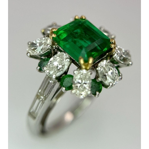 4 - A Stunning Emerald and Diamond Ring. Emerald cut centre emerald - 2.5ct with an emerald -0.8ctw and ... 