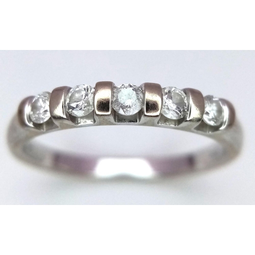 425 - A 9K WHITE GOLD DIAMOND BAND RING. 0.25CT. 1.8G. SIZE L.