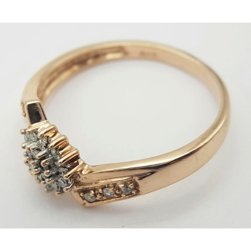 432 - A 9K ROSE GOLD DIAMOND CLUSTER RING. 2.2G. SIZE O 1/2.