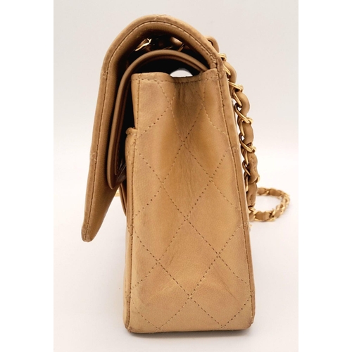 45 - A Beige Chanel Classic Matelasse Double Flap Bag. Quilted leather exterior with gold-toned hardware,... 