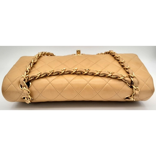 45 - A Beige Chanel Classic Matelasse Double Flap Bag. Quilted leather exterior with gold-toned hardware,... 