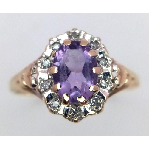 453 - A 9K YELLOW GOLD DIAMOND & AMETHYST RING 1.7G SIZE N.

SC 1092