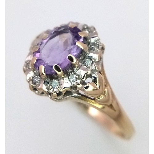 453 - A 9K YELLOW GOLD DIAMOND & AMETHYST RING 1.7G SIZE N.

SC 1092