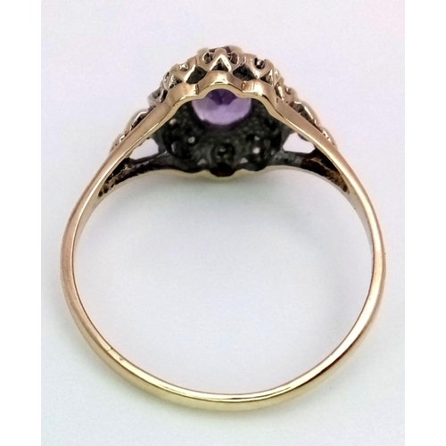 453 - A 9K YELLOW GOLD DIAMOND & AMETHYST RING 1.7G SIZE N.

SC 1092