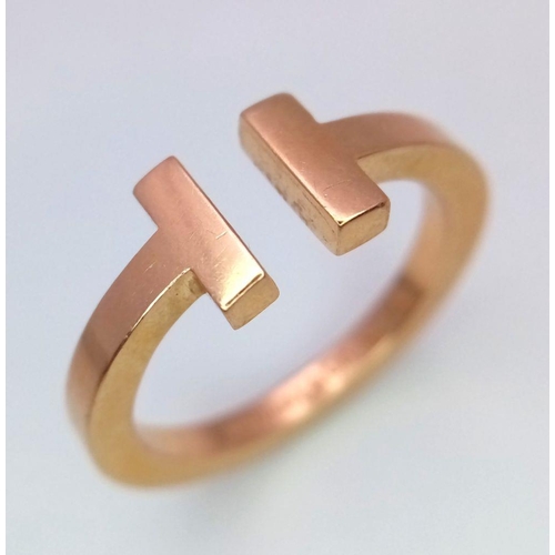 47 - A TIFFANY & CO 18K YELLOW GOLD T SQUARE RING. 7G. SIZE T.