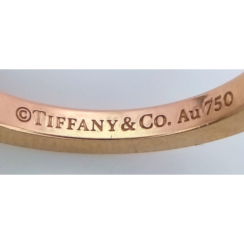 47 - A TIFFANY & CO 18K YELLOW GOLD T SQUARE RING. 7G. SIZE T.