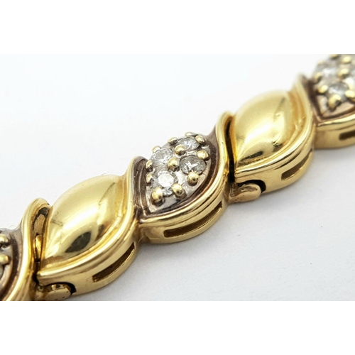 5 - A 14K YELLOW GOLD DIAMOND BRACELET - 0.72CT. 22.7G TOTAL WEIGHT.