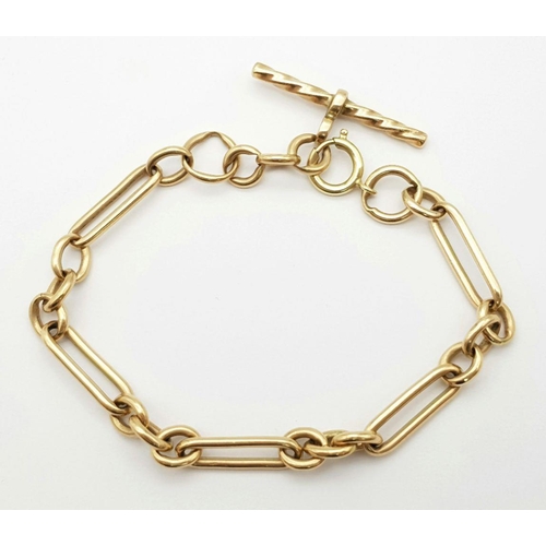 54 - A 9K ROSE GOLD VINTAGE TROMBONE ALBERT BRACELET WITH T BAR. 32.9G.